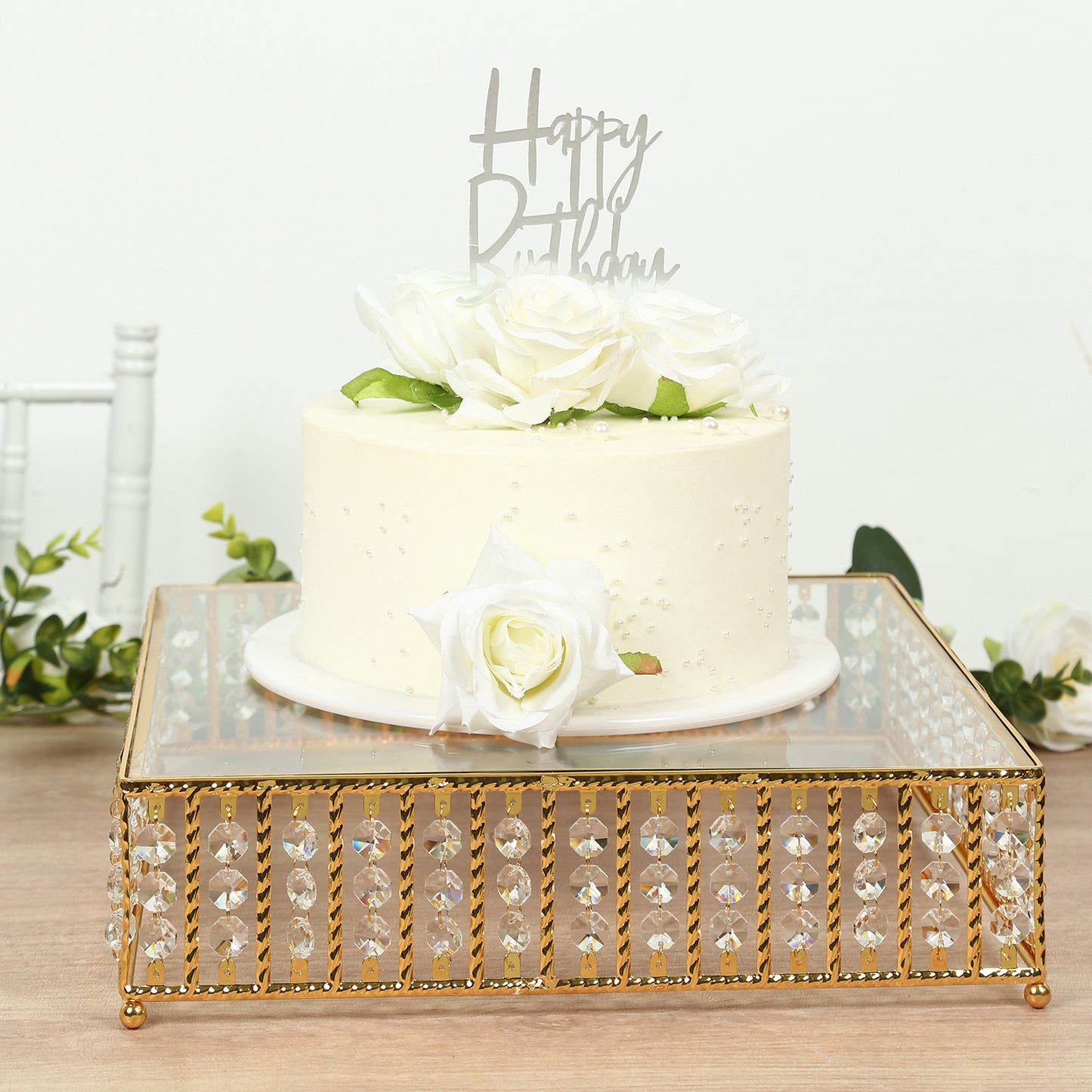 14" gold cake stand with crystal beads and glass top for dessert display.