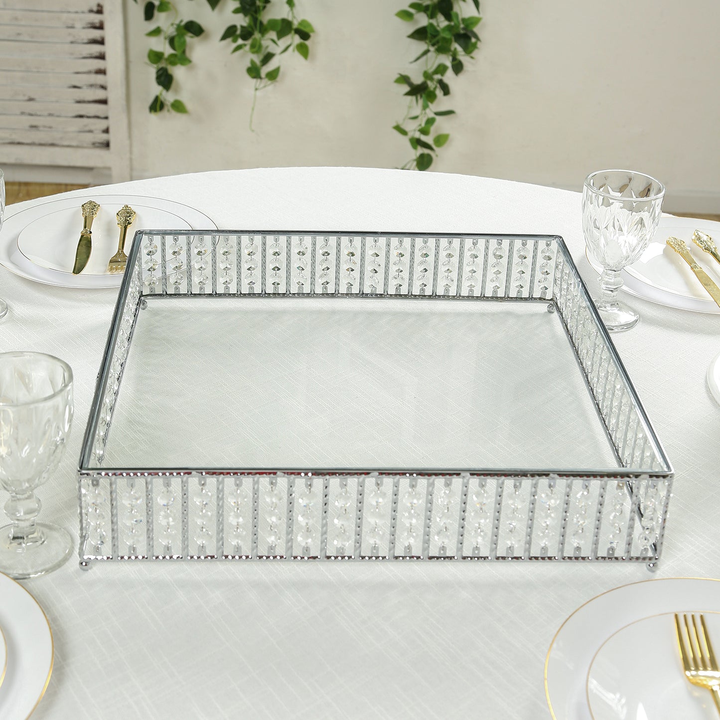 Silver 18" square cake stand with hanging crystal beads and glass top.