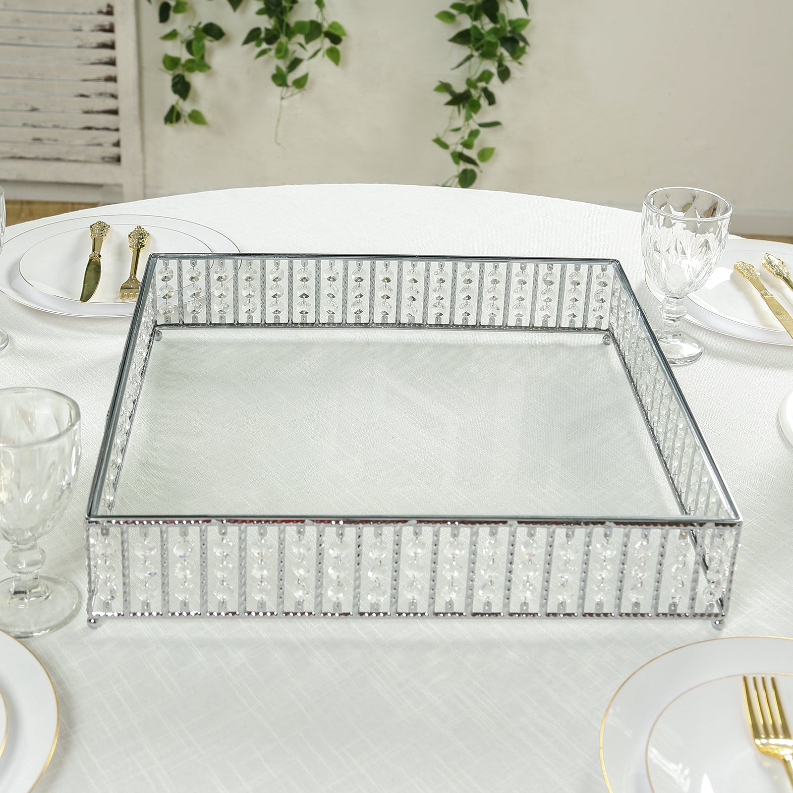 Silver 18" square cake stand with hanging crystal beads and glass top.
