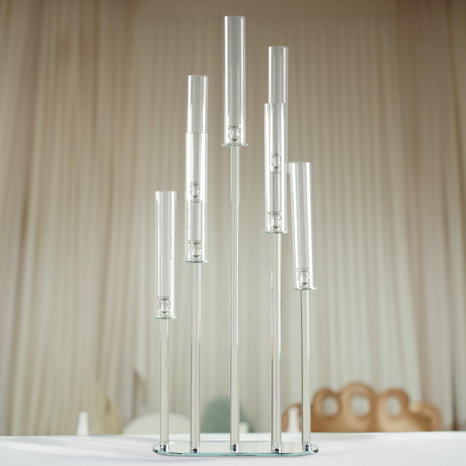 Clear crystal 7-arm cluster candlestick stand with hurricane shades.