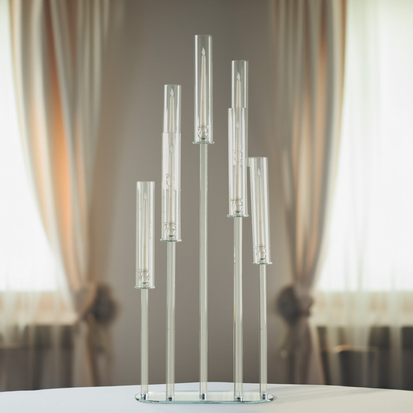 Clear crystal 7-arm candlestick stand with hurricane shades.