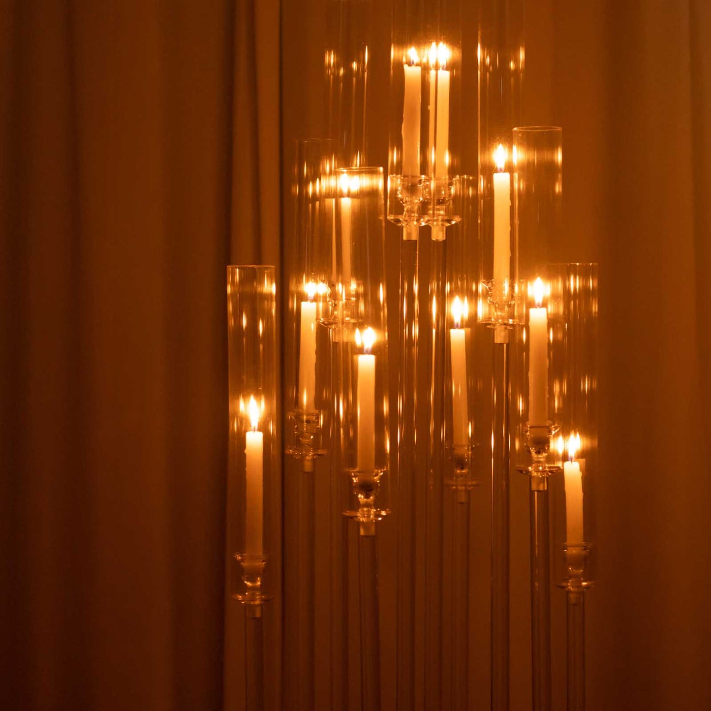 Clear acrylic cluster candle holder with taper candles.
