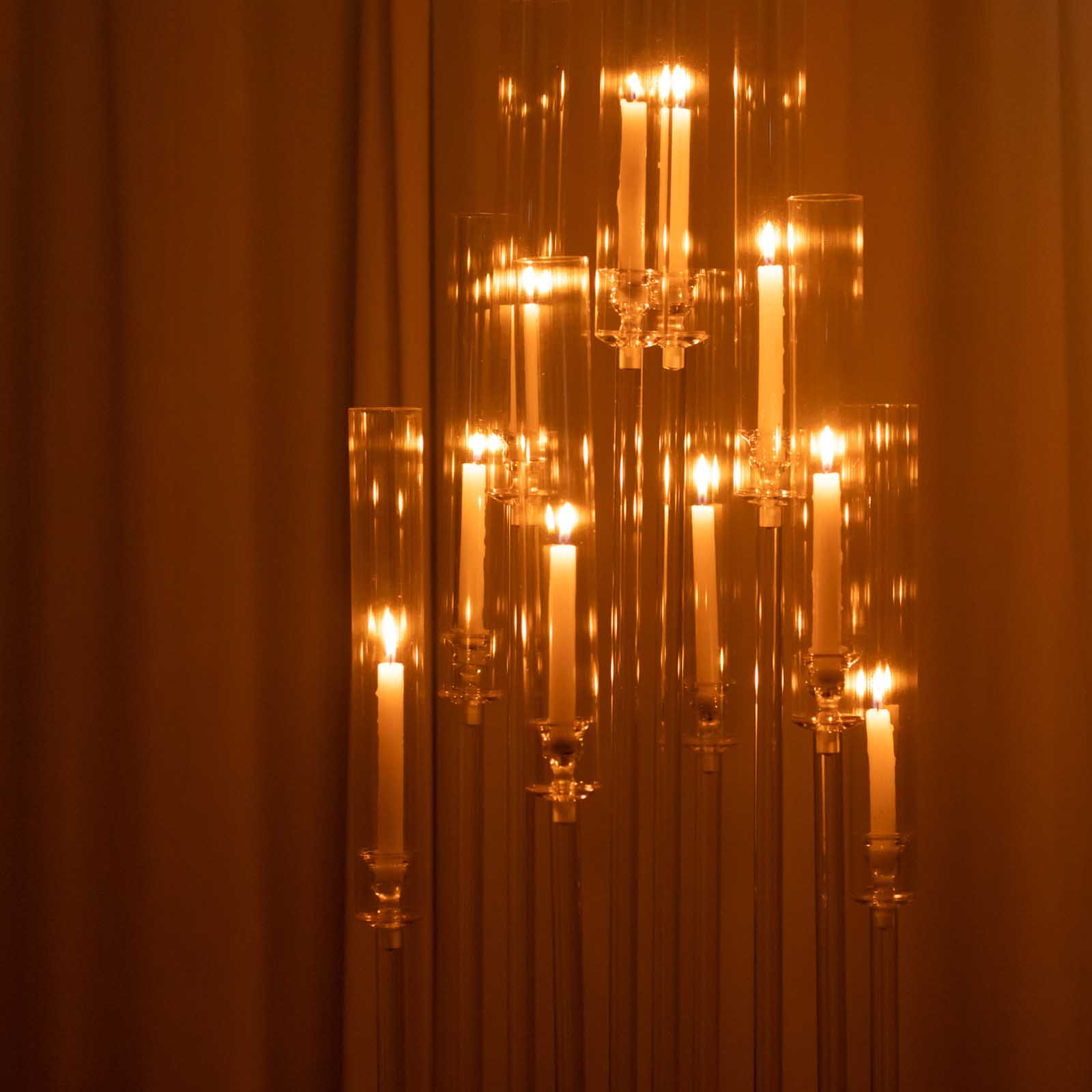 Clear acrylic cluster candle holder with taper candles.