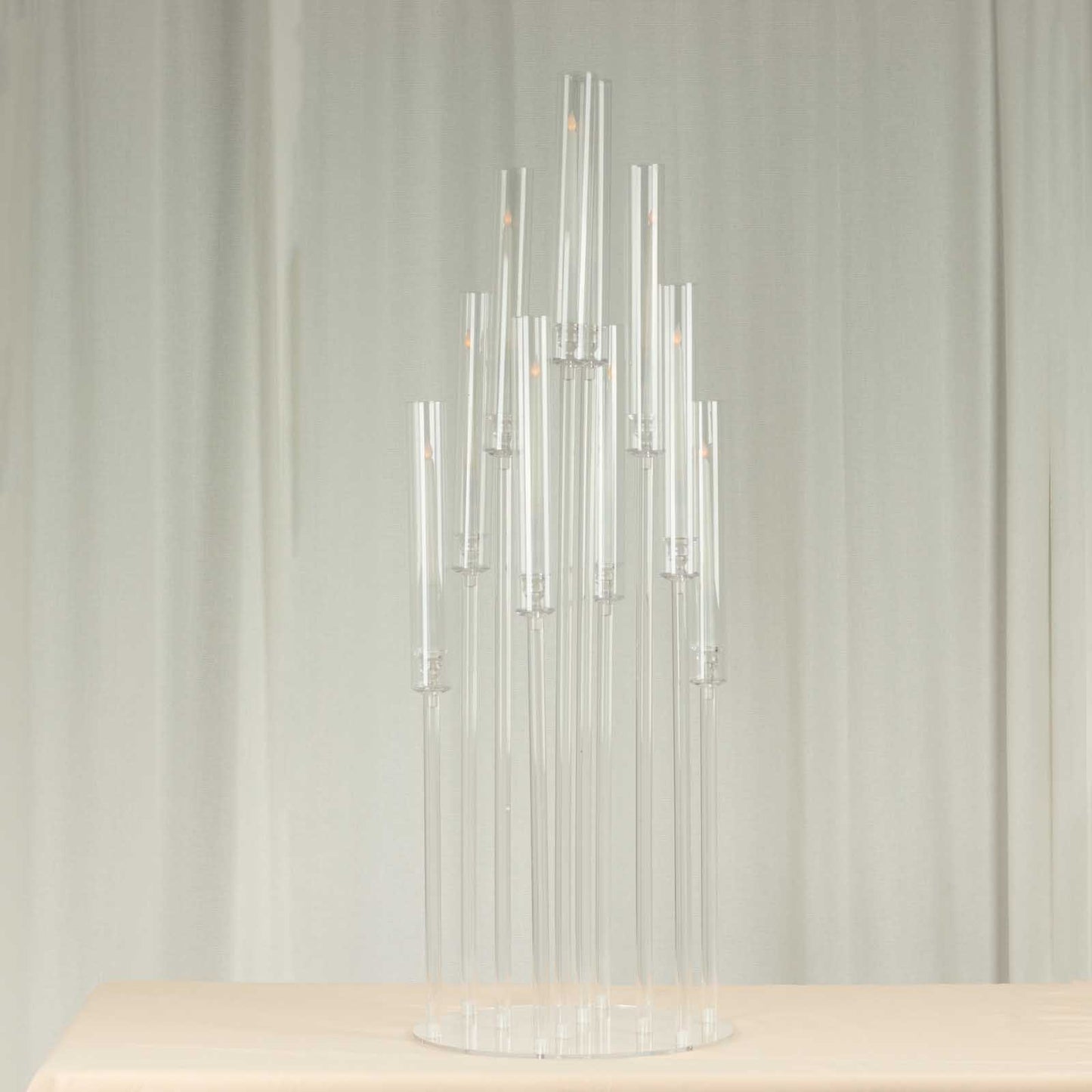 Clear acrylic cluster candle holder stand, 47" tall, with 10 arms.