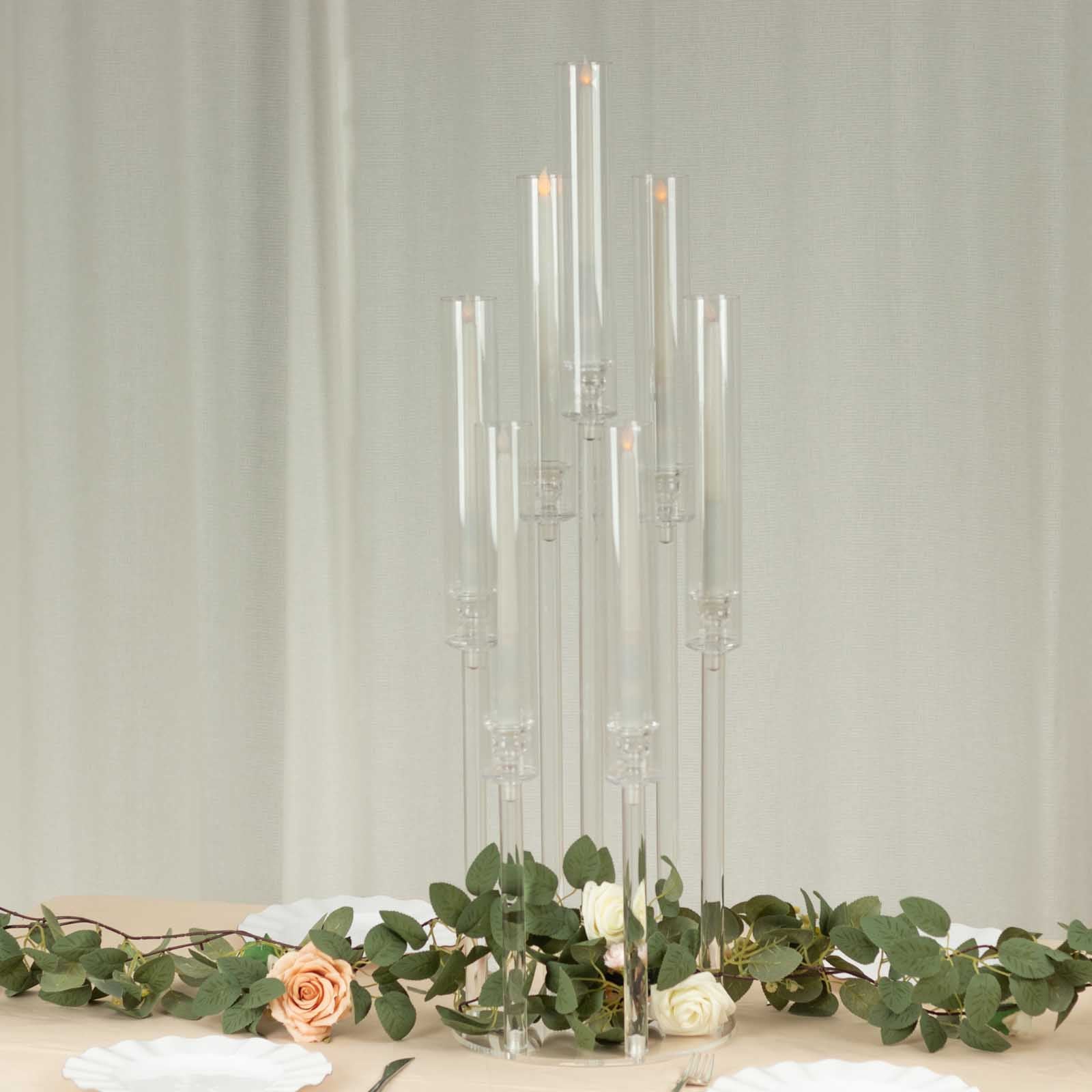 Clear acrylic 7-arm candelabra with circular base, 33" tall.