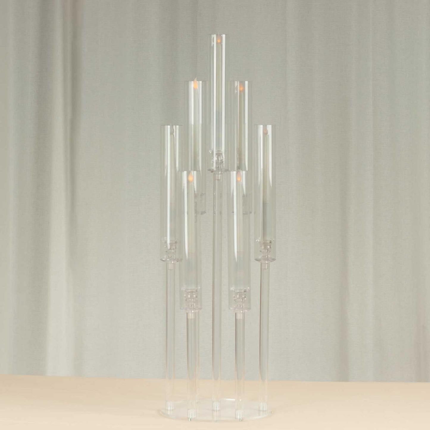 Clear acrylic 7-arm pillar candle holder stand, 33" tall.