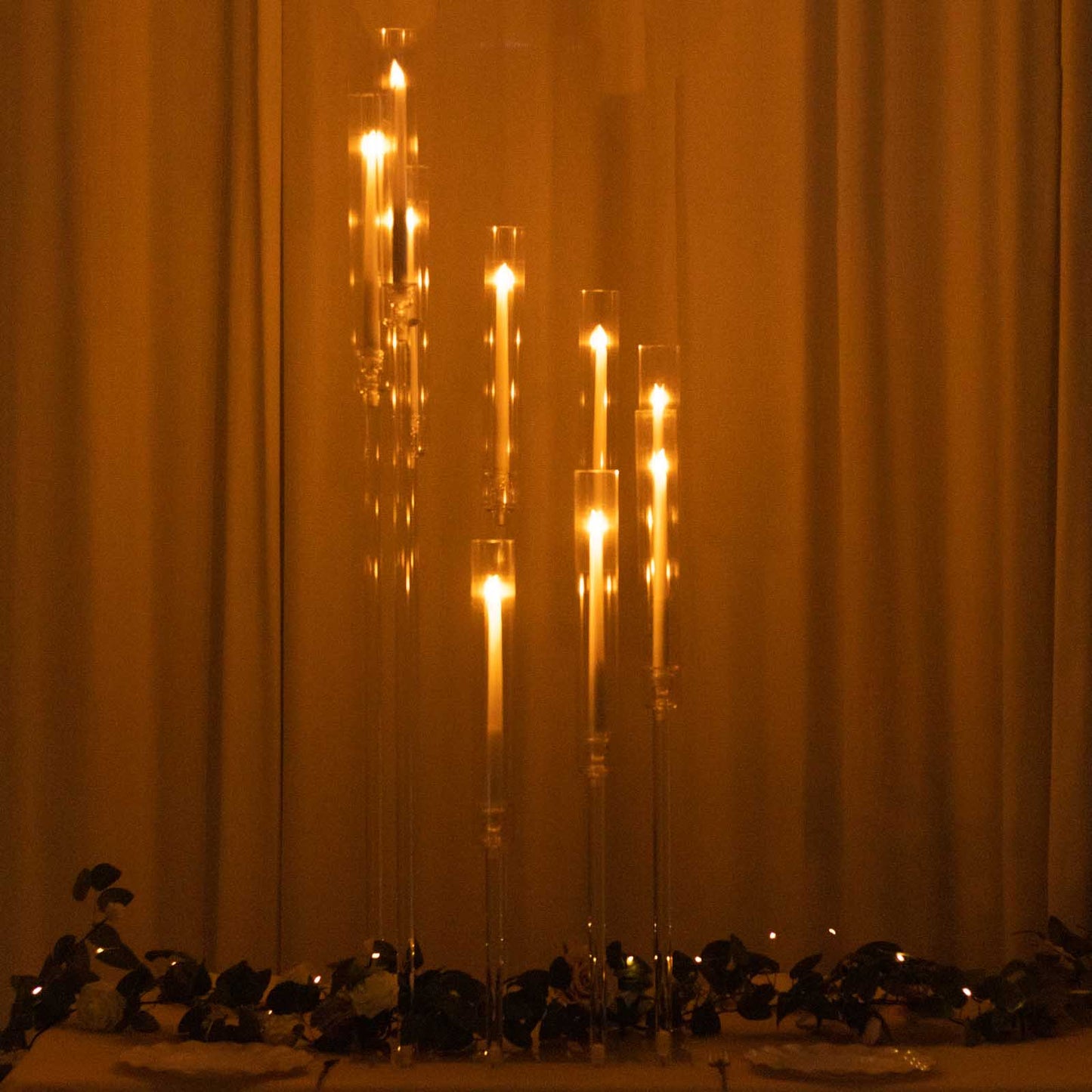 Clear acrylic candelabra with multiple taper candle holders, 4ft tall.
