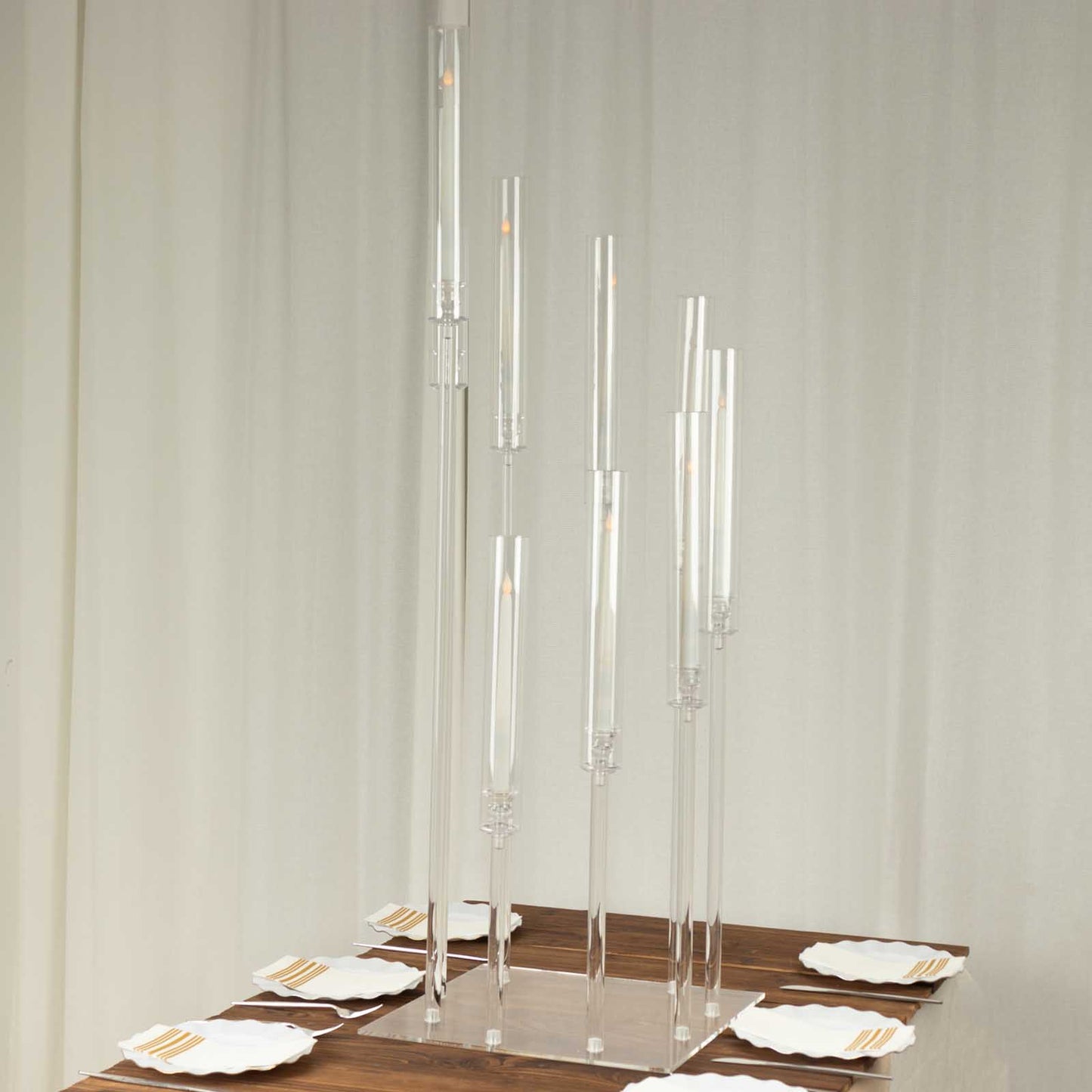 Clear acrylic cluster pillar candle stand, 4ft tall, with square base.