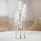 Clear crystal candelabra with mirror base for votive candles.