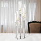 Clear crystal candelabra with mirror base for votive candles.