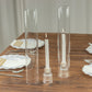 Clear glass candle shades with candles, 14" tall, elegant table setting.