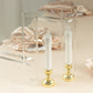 Clear glass candle shades with open ends, 12 inches tall.