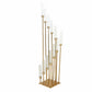 Gold 12 arm cluster taper candle holder with clear glass shades.