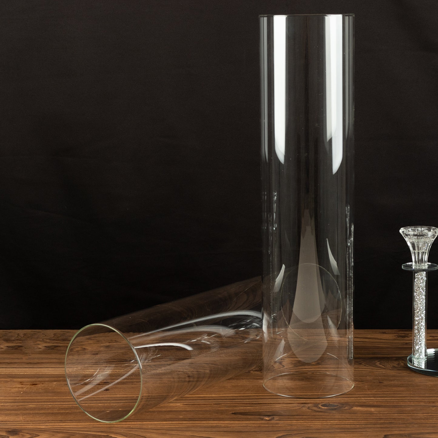 Clear glass candelabra candle holder shades, 20 inches tall.