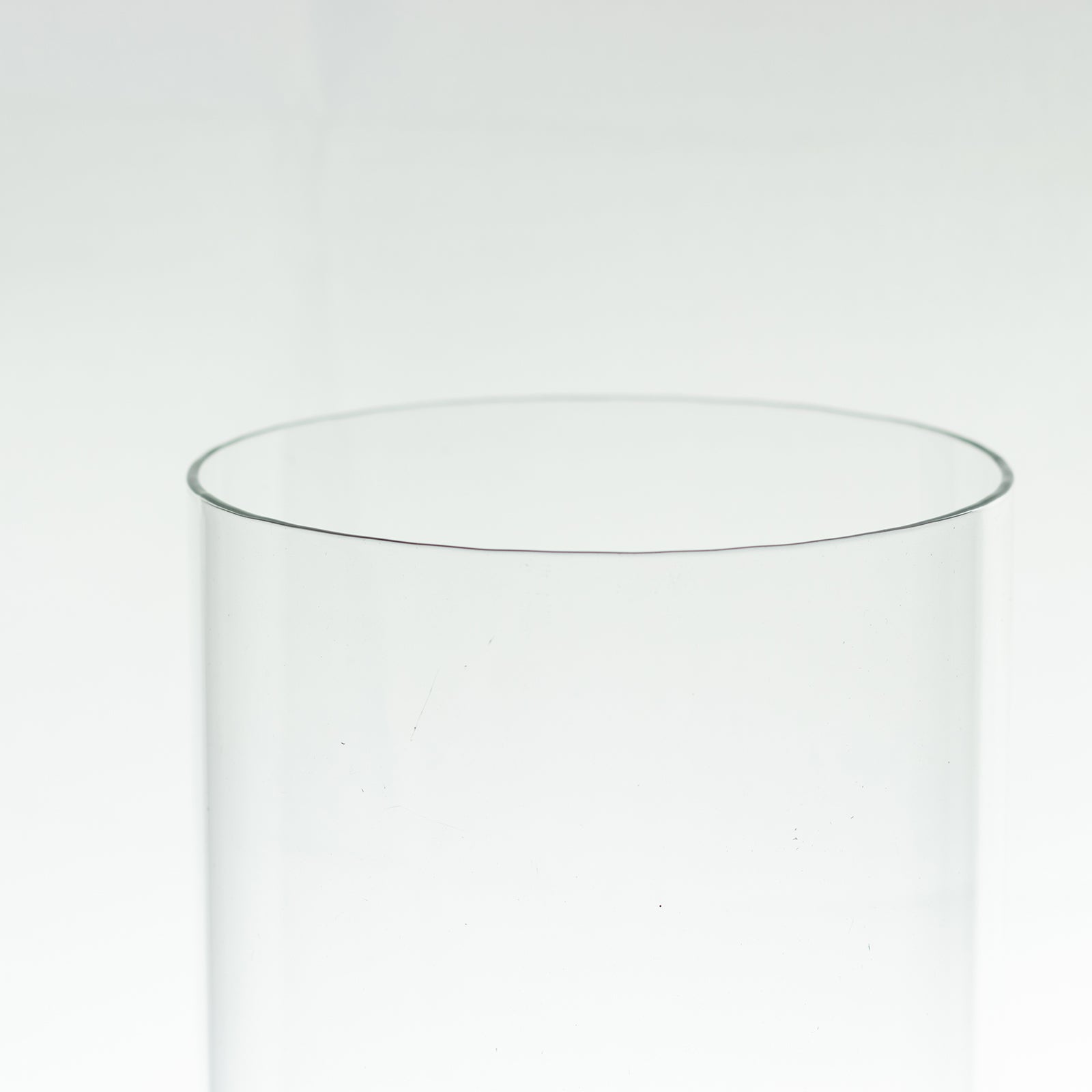 Clear candelabra candle holder glass shade with open ends.