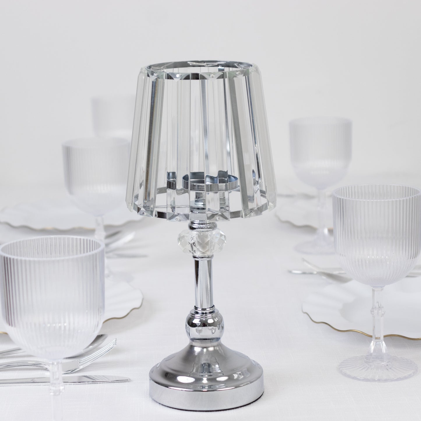 Silver crystal pendant candle holder for elegant table centerpieces.