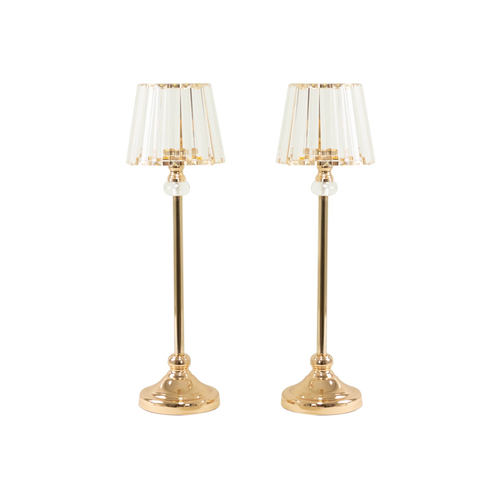 Gold crystal pendant candle holders with classic empire lamp shades.