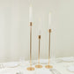 Gold taper candle holders with hurricane glass shades, set of 3.