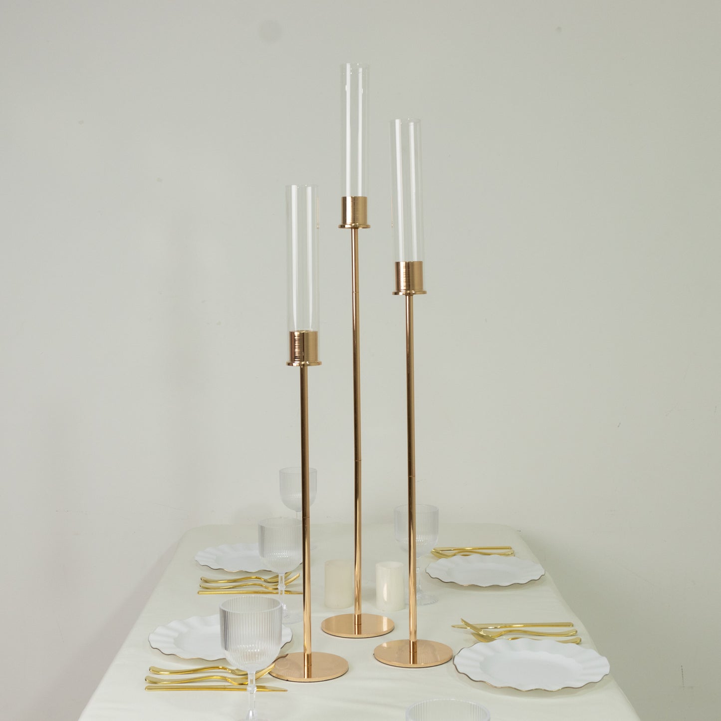 Gold metal taper candle holders with hurricane glass shades, set of 3.