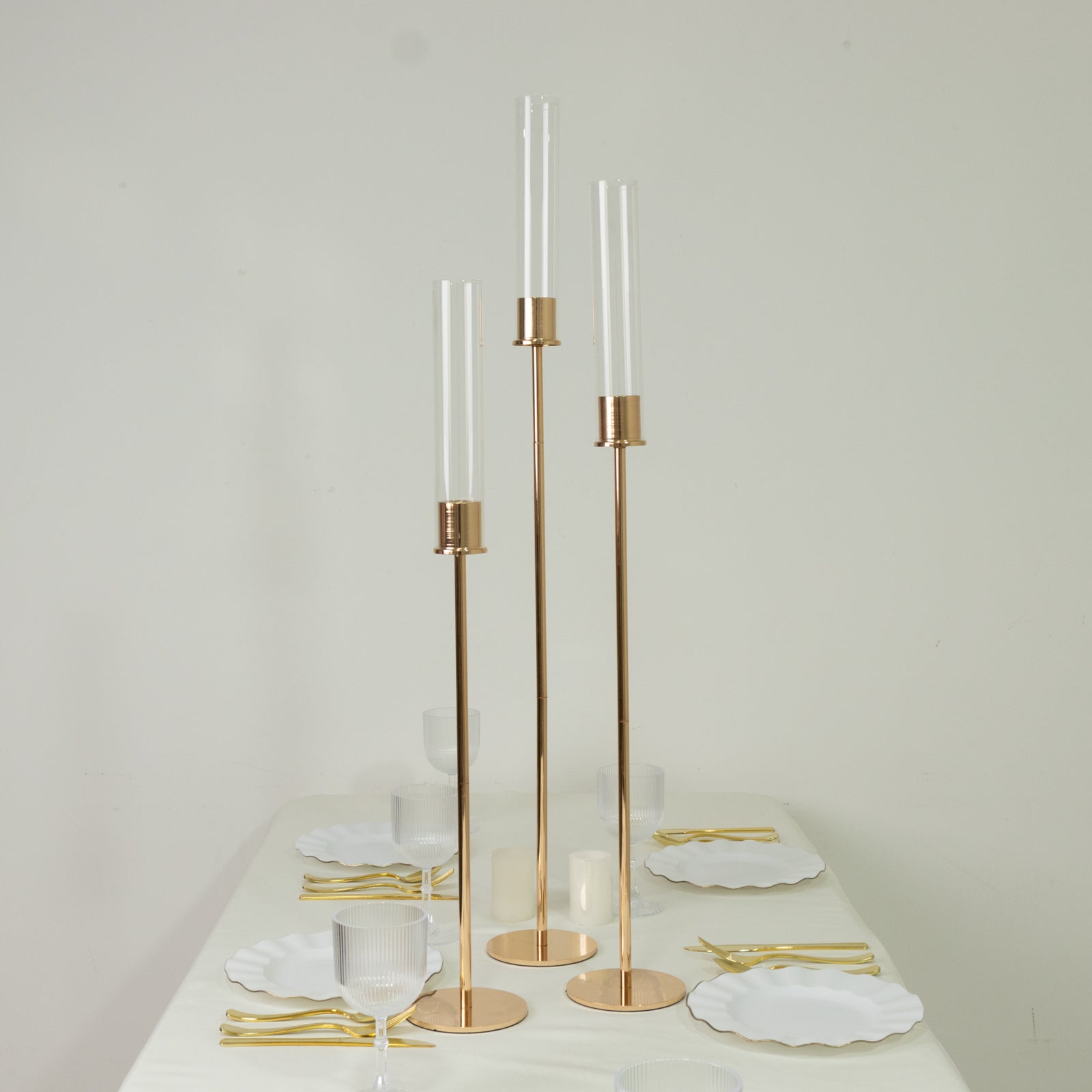 Gold metal taper candle holders with hurricane glass shades, set of 3.