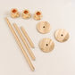 Tall gold metal candlestick holder set with clear glass shades.