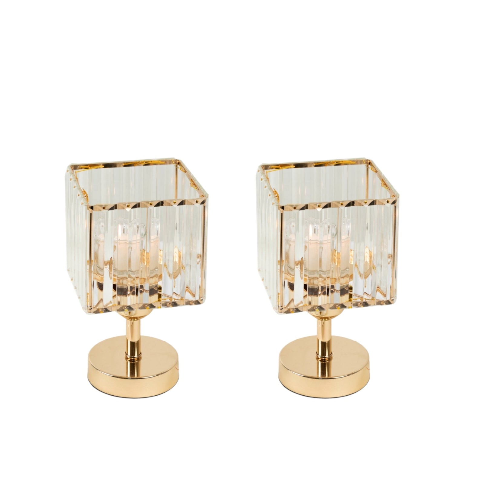 Gold crystal hurricane candle holders for elegant table centerpieces.