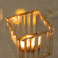 Gold crystal pendant hurricane candle holder with elegant square design.
