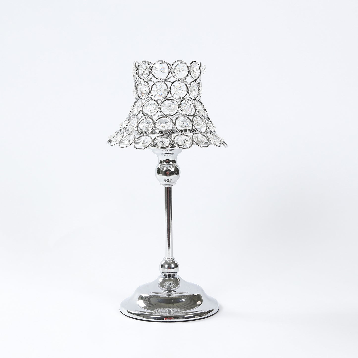 Silver crystal beaded candle holder with lamp-inspired shade.