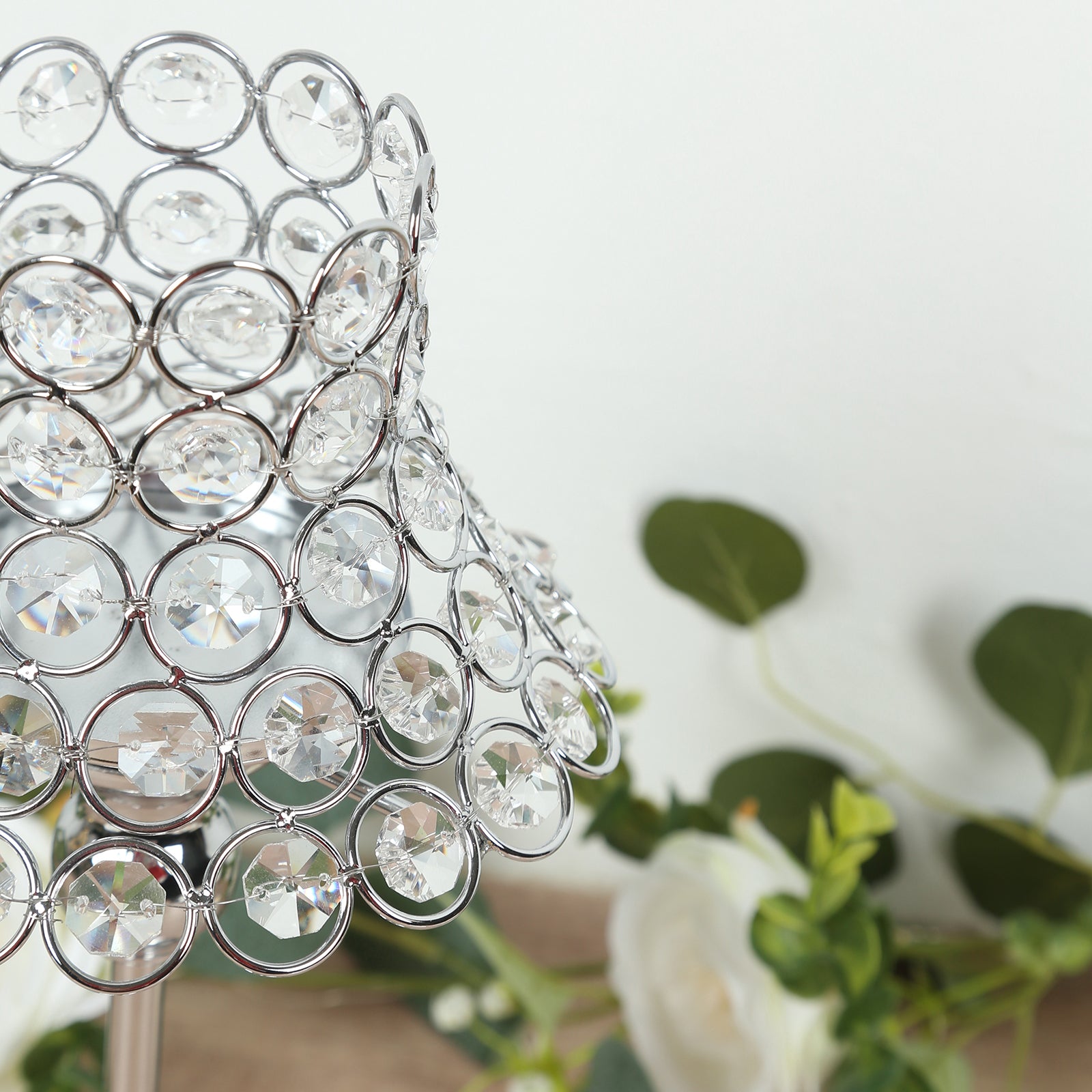 Silver crystal beaded candle holder with lamp-inspired shade.