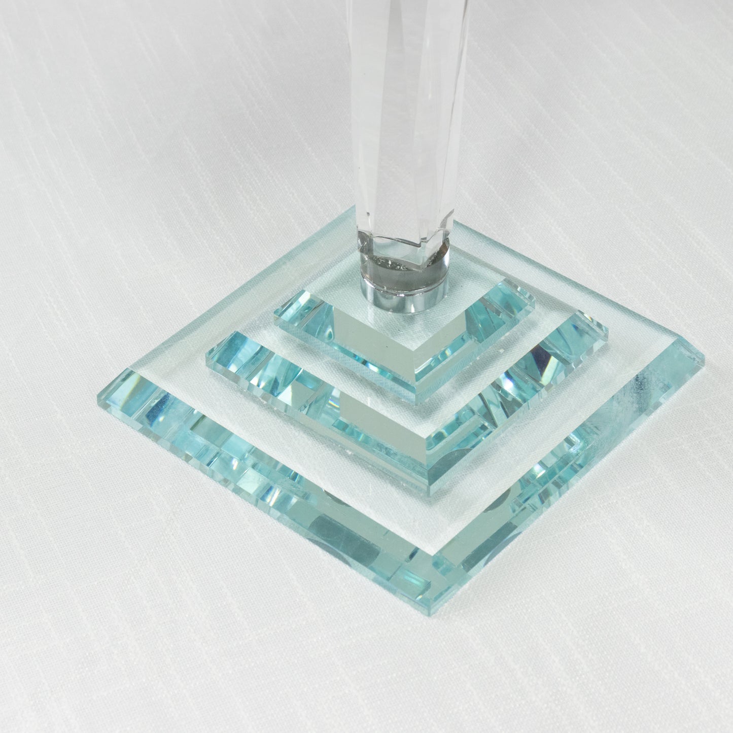 Elegant crystal candelabra taper candle holder with clear glass shades.