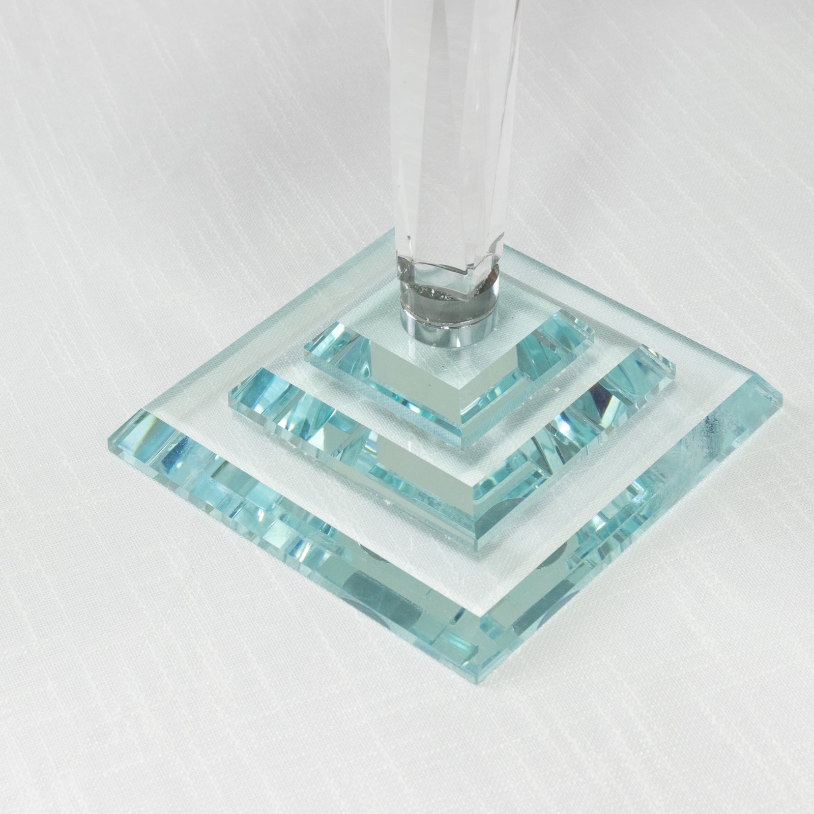 Elegant crystal candelabra taper candle holder with clear glass shades.