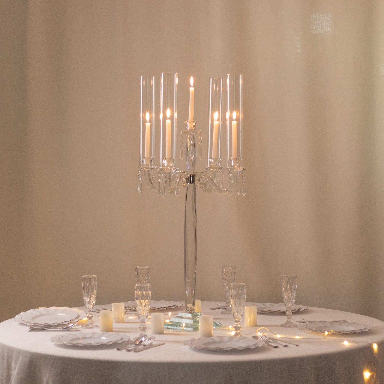 Elegant crystal candelabra taper candle holder centerpiece with glass shades.