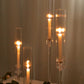 Clear acrylic hurricane candle stands with taper candles, 14"-26" tall.