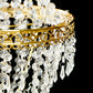 Gold beaded crystal chandelier with ornate metal frame and adjustable hanging design.