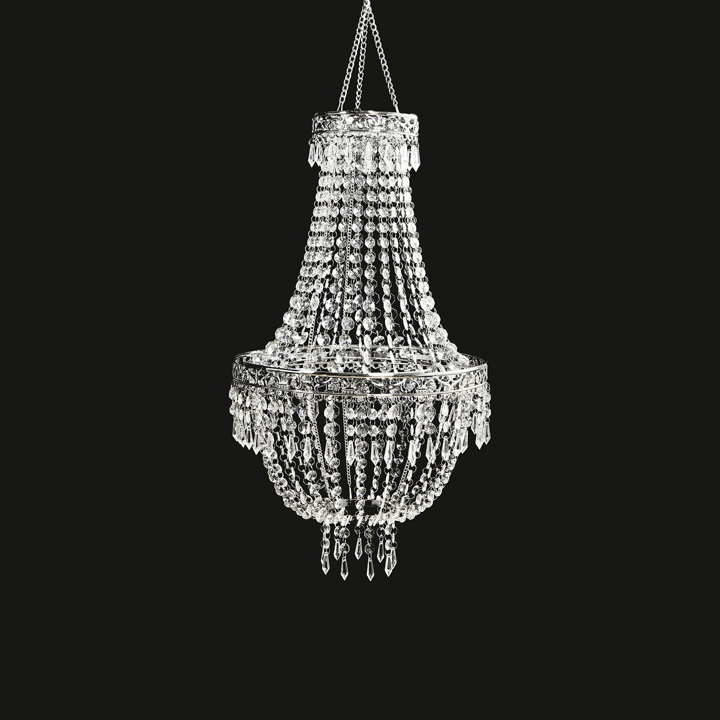 Silver beaded crystal chandelier with ornate metal frame.