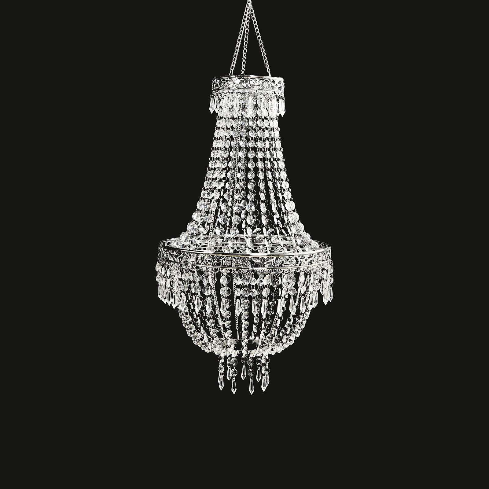 Silver beaded crystal chandelier with ornate metal frame.