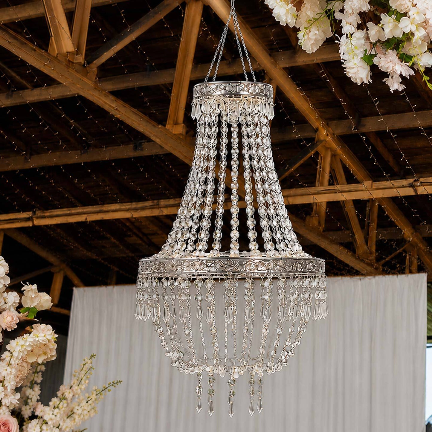 Silver beaded crystal chandelier with ornate frame, farmhouse pendant lighting.