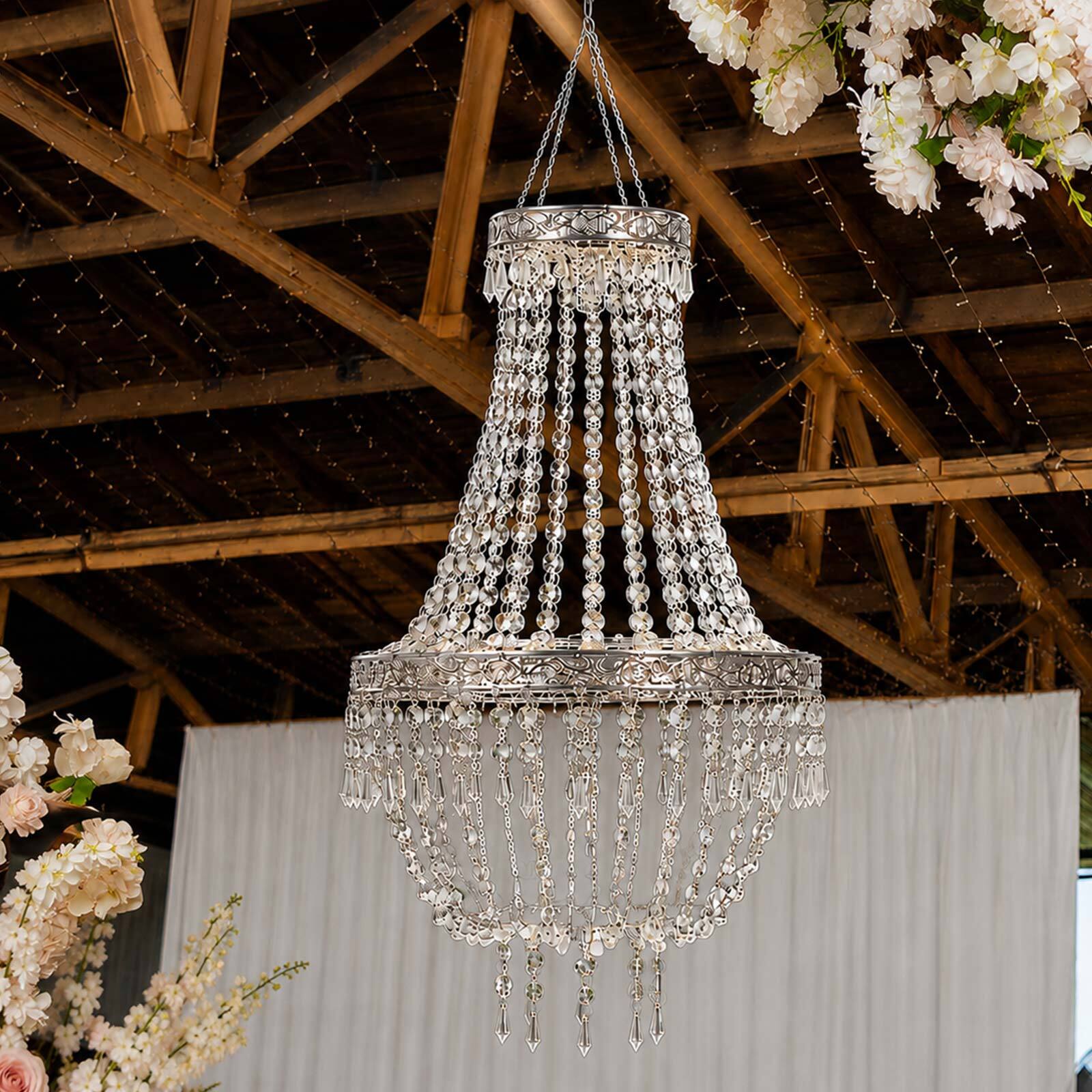 Silver beaded crystal chandelier with ornate frame, farmhouse pendant lighting.