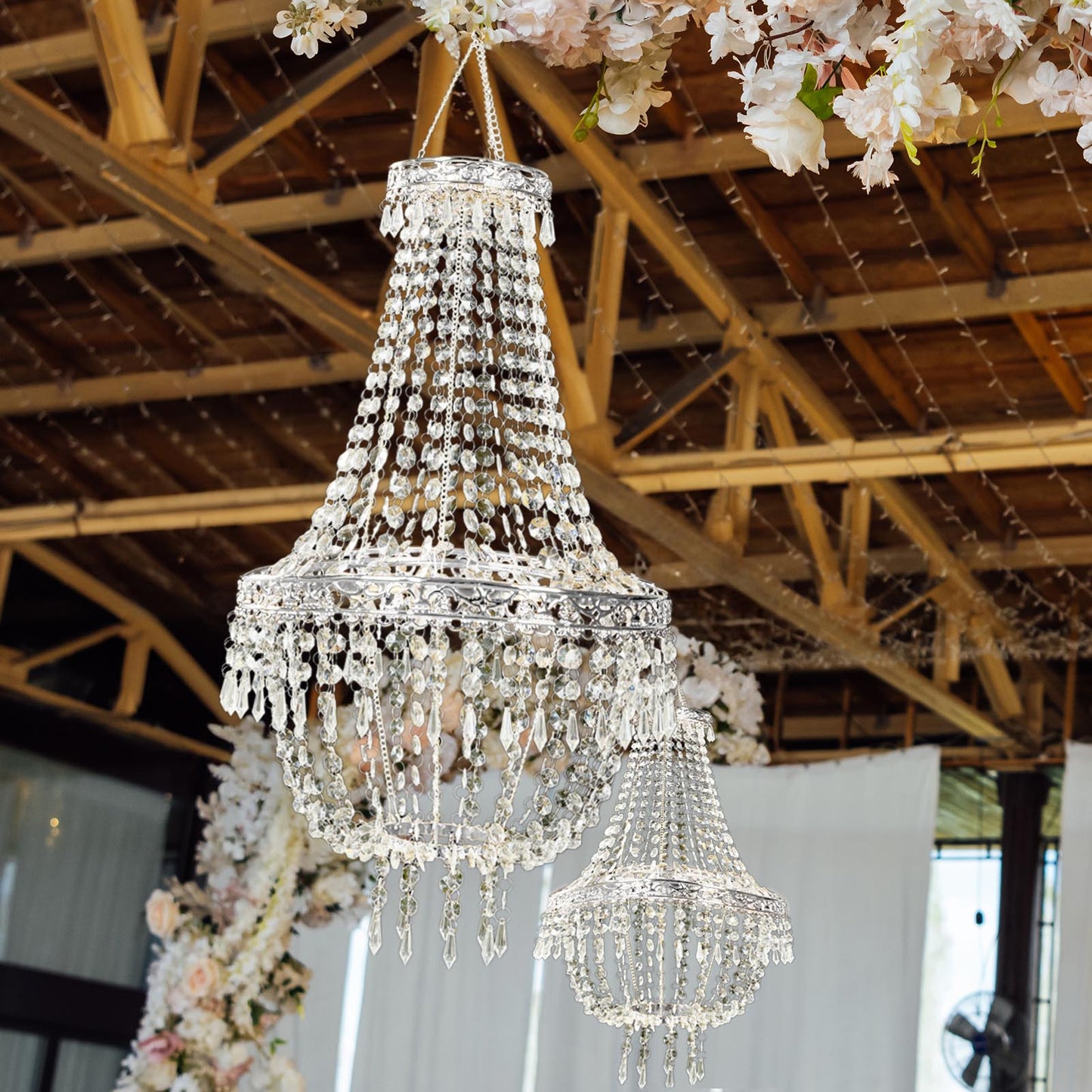 Silver beaded crystal chandelier with ornate frame, farmhouse pendant lighting.