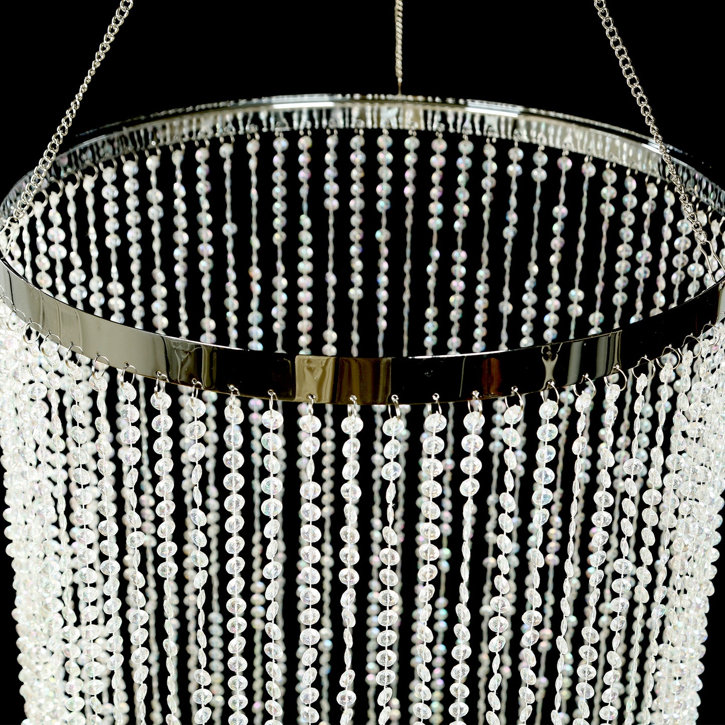 Silver crystal beaded chandelier with hanging chain, elegant design.