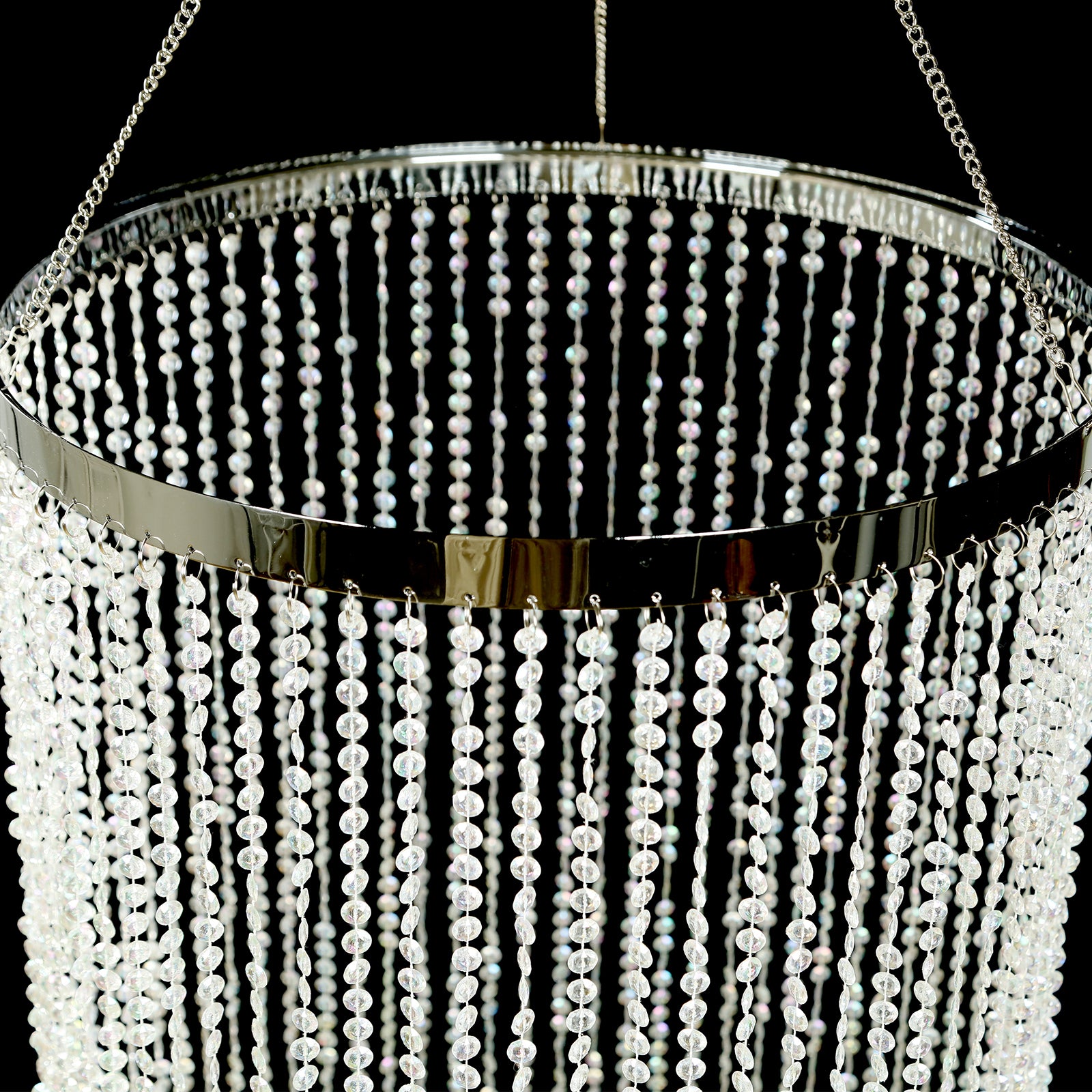 Silver crystal beaded chandelier with hanging chain, elegant design.