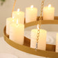 Gold chandelier frame with candles and floral display, elegantly lit.