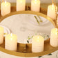 Gold floral chandelier with candles and floral display.