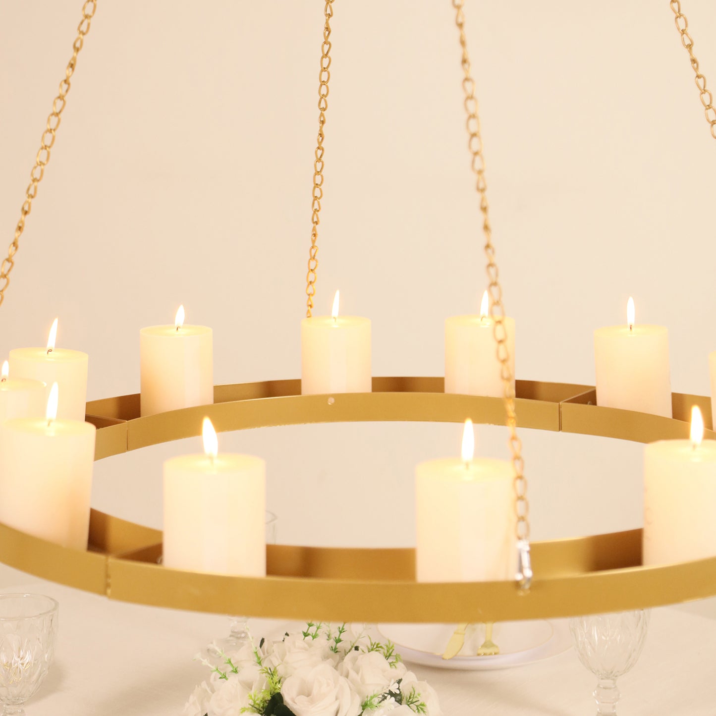 Gold hanging metal floral chandelier with candles, 32" circular design.