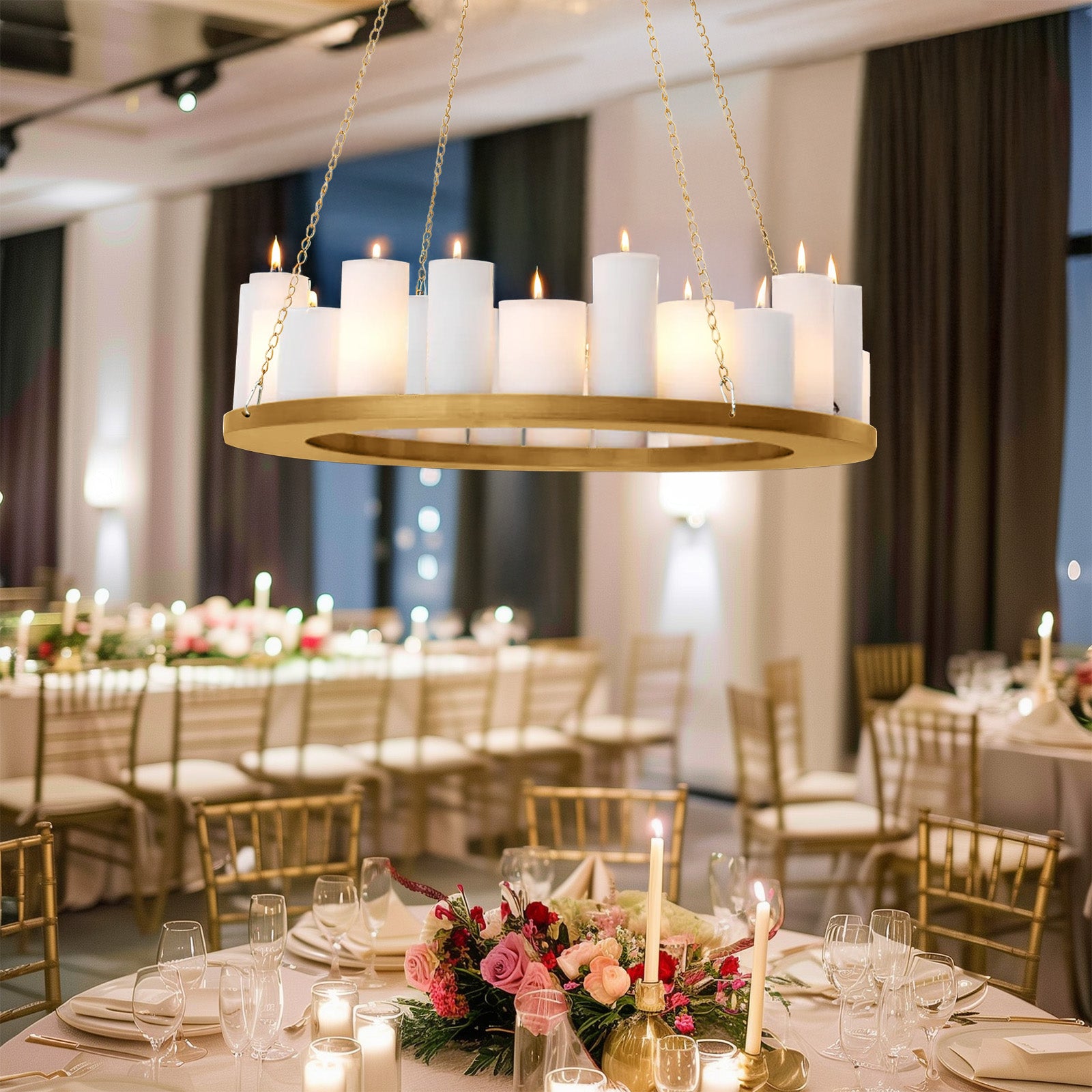 Gold floral chandelier frame with candle and floral display in elegant setting.