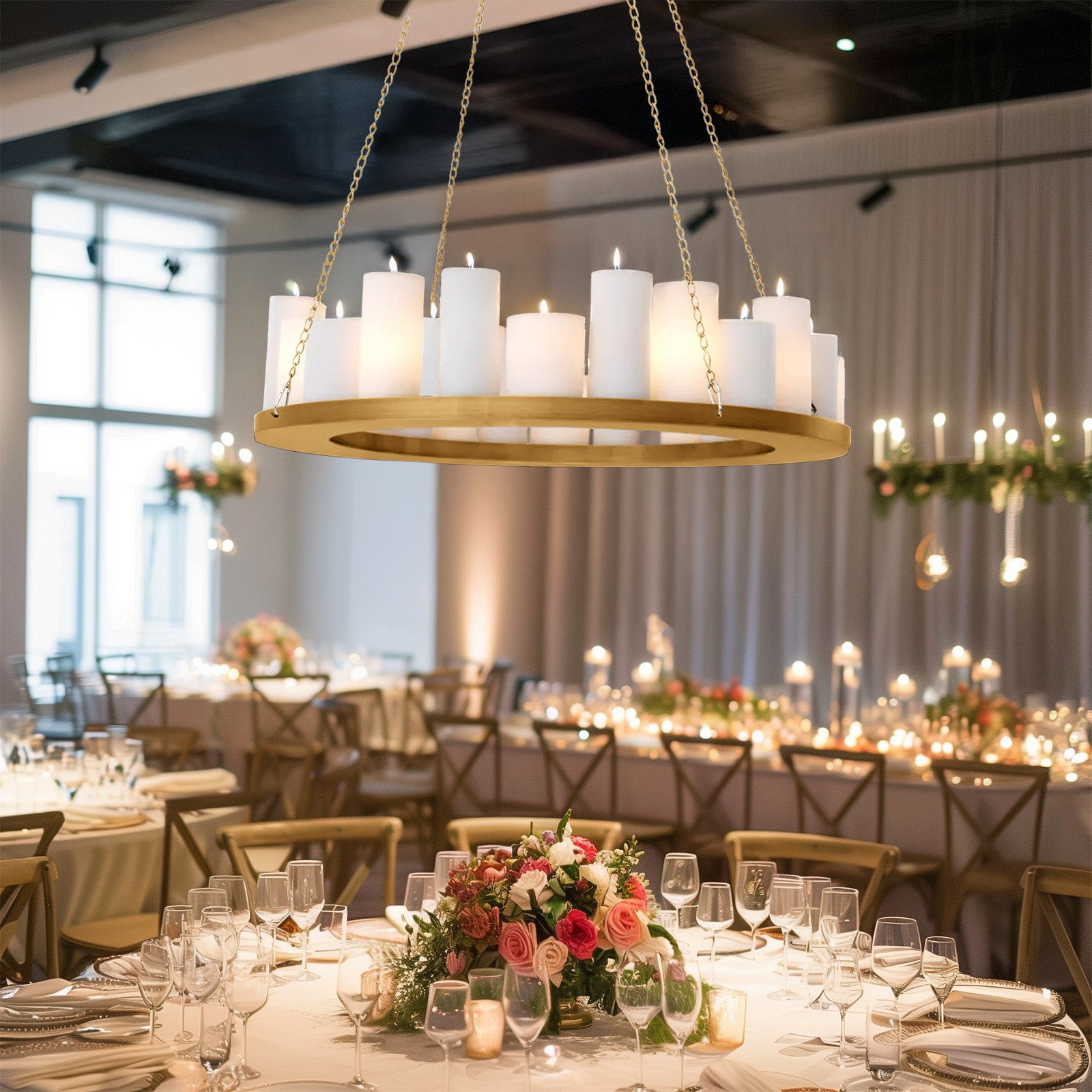 Gold chandelier frame for candle and floral display in elegant dining setting.