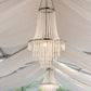 Elegant silver chandelier with crystal beads in an elegant setting.
