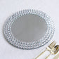 Silver mirror glass charger plate with diamond beaded rim.
