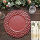 Matte finish burgundy hammered charger plate on a rustic table setting.