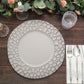 Matte finish gray hammered charger plate on a wooden table setting.